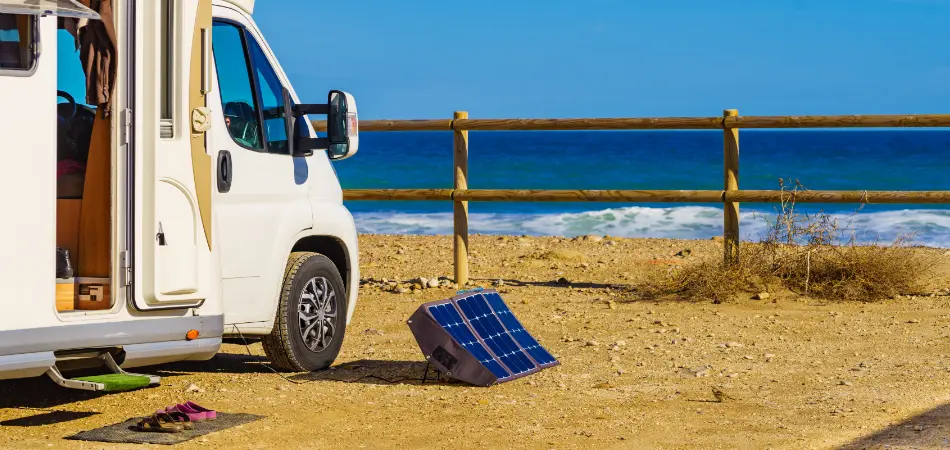 Solar panels charge a camper's deep cycle batteries
