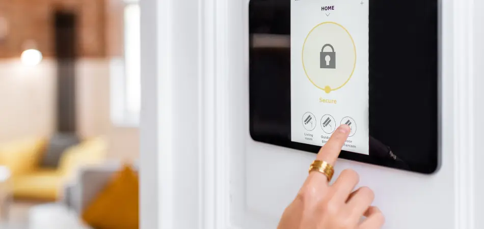 A woman sets the home alarm